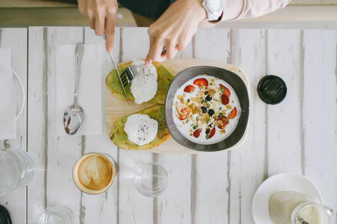 person preparing healthy breakfast